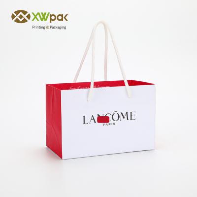 China Custom print shopping paper bags with your own logo for sale