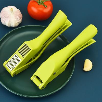 China MYGO Premium 304 Stainless Steel Plastic Circular Garlic Crusher Garlic Press Rocker Rocker Meat Grinder Manual Tool Tool for sale