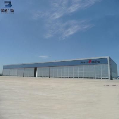 China Modern Top Guided Bottom Rolling Automatic Steel Sliding Shed Doors for sale