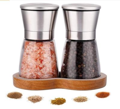 China Sustainable Salt and Pepper Grinder Set with Wooden Stand Tray Refillable Pepper Mill Set Brushed Stainless Steel Short Glass Shaker for sale