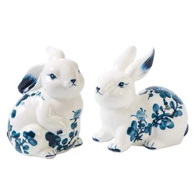 China Artisan Hot Selling Hand Painted Living Room Blue And White Modern Porcelain Rabbit Cracked Ornament for sale