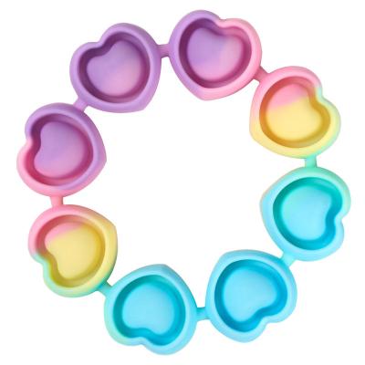 China TT73 Custom Trigger Sound Bubble Bracelets For Kids Push Bubble Wrist Strap Silicone Trigger Bracelet Heart Sound Sensory Bracelet for sale