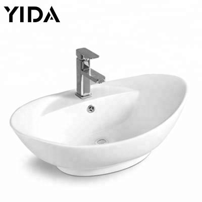 China Sustainable Palestine Bathroom Manufacture Foshan Ceramic White Color Countertop Mounted Hotel Wash Basin for sale