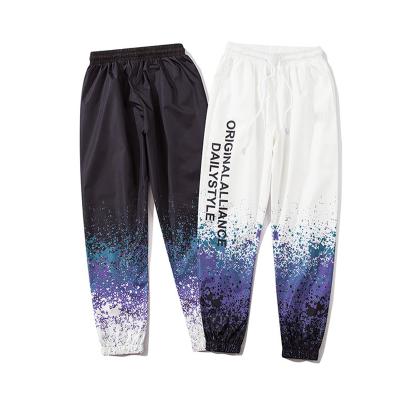 China Custom Anti-Wrinkle Letter Printed Jogging Pants For Men for sale