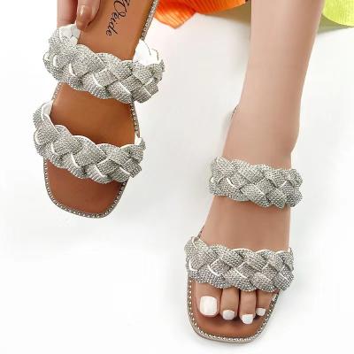 China Women's Fashion Trend Slippers Women's Bohemian Slippers Open-toe Toe Flat Summer Woven Flip Flops for sale