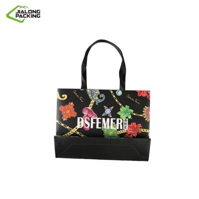 China Recycled Materials Gift Bag Coated Paper Bag For Clothing Store Can Be Printed Logo for sale