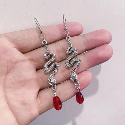 China Crystal Earrings Bohemian Style Rhinestone Circle Perforations Snake Shaped CLASSIC Gothic Hand Earrings Snake Shaped Dangle Earrings For Ladies for sale