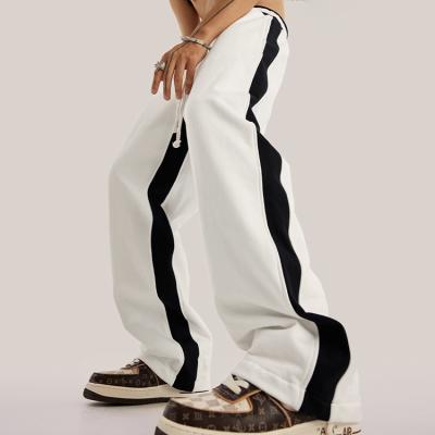 China 2022 QUICK DRY autumn and winter new American style stitching side contrast straight leg pants loosen wide leg sports pants for sale