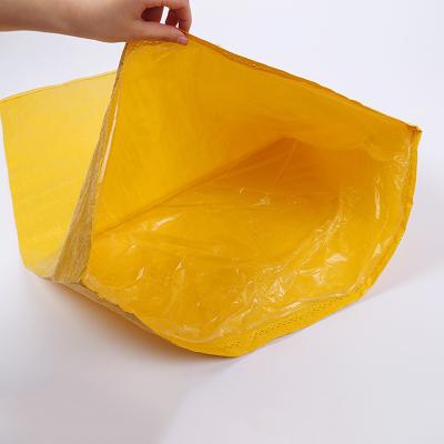 China Moisture Proof Wholesale Yellow Woven Feed Bags for Plastic Moisture Proof Bagging Flexo Printing for Food Industrial Use for sale