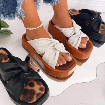 China New Design Waterproof Women Wedge Sandals Designer Cross Strap PU Leather Slippers Plus Size Thick Unique Sandals For Ladies for sale