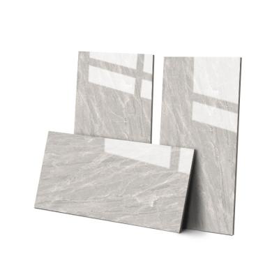 China Modern new design modern tile wholesale prices glazed cheap prices high quality metallic polished porcelain glazed tiles 750x1500mm for sale