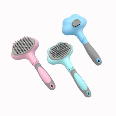 China New Pet Grooming Hair Removal Comb Viable Dog Massage Comb Automatic Pet Supplies for sale