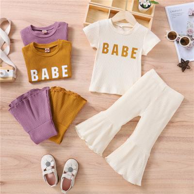 China Wholesale Kids Girl Clothing Cotton Shorts Sleeve T-shirt+Ruffle Short Sleeve Pants Child Girl Clothing Set 2pcs for sale