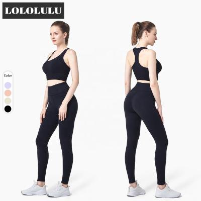 China Custom Logo Breathable U-scoop Yoga Bra And Tight Sport Pants Set Seamless Yoga Set Gym Wear for sale