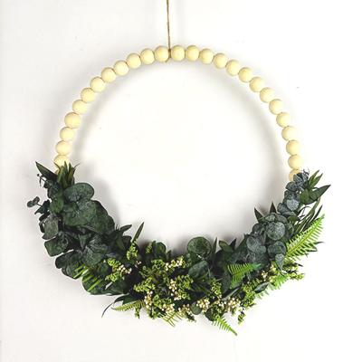 China Hot Selling Creative Pearl Wedding Decorations 2022 Home Party Decoration Christmas Wreath Boxwood Wedding Wreath European Style Premium Wooden Wreath for sale