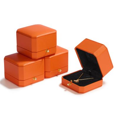 China FANXI Portable Jewelry Box Customized Luxury Portable Jewelry Box Orange Color Set PU Leather Jewelry Box With Logo For Ring Pedant Earring for sale