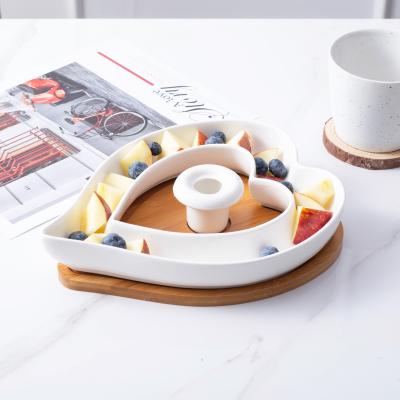 China Sustainable Food Safe Heart Shaped Dinnerware Ceramic Nut Dish Wedding Fruit Dishes for sale