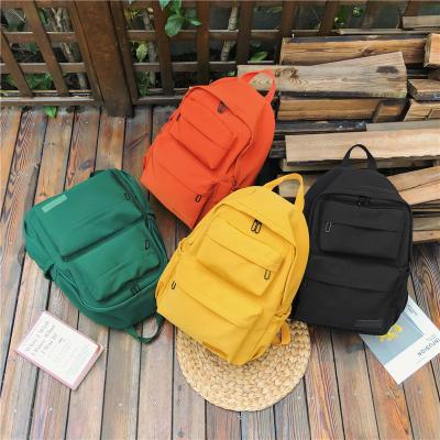 China The Other New 2021 Student Schoolbag Female Korean Large Capacity Travel Solid Color Multi Layer Backpack For Women for sale