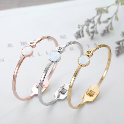 China Classic FASHIONABLE Shell Roman Numerals Double Round Stainless white Roman Numeral Bracelet Gold Plated Steel Direct Selling For Women for sale