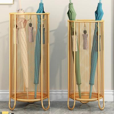 China Durable Metal Cylindrical Umbrella Storage Rack Door Holding Hollow Grid Put Umbrella Bucket for sale