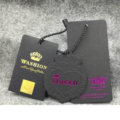 China Hot Stamping 1500gsm Sustainable Gold Kraft Paper Hanger Tag With Eyelets for sale