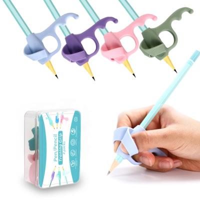 China Lead Silicone Grip Rubber Fingertip Grips Ergonomic Writing Pencil Holder Writing Aid Grip Writing Corrector for sale