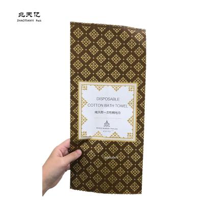 China 50g Back Seal Eco-friendly Packaging Coated Disposable Paper Bag For Towel Bath Wash Towel Bread Flower Cake for sale