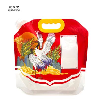 China Rice Spout Packaging Bag 2.5kg 5kg Color Printing Moisture Proof Transparent Food Sealed Carry Bag For Grains With Handle for sale