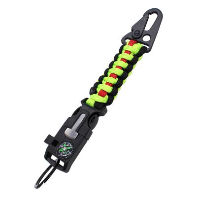 China Outdoor Camping Hiking Survival Self Defense Traveling Compass Ferro Rod Paracord Keychain With Emergency Whistle for sale