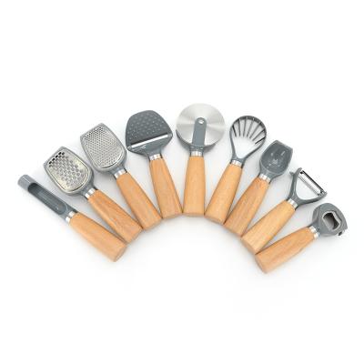 China Hot Selling Smart Viable Gadgets For Kitchen 9pcs Wooden Handle Kitchen Cookware Set for sale