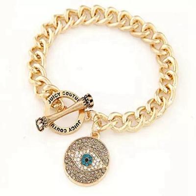 China Hiphop Hotsale Simple Design Rhinestone Eye Bangle Thin Gold Alloy Charm Bracelet for sale