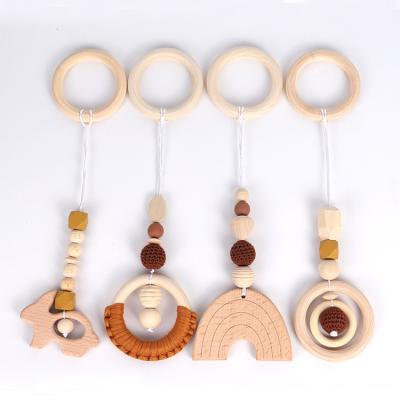 China Baby Toys 4PCS/Set Chewable Baby Teether Set Play Gym Letter Beads Wooden Rattle Ring Teething Toys Wooden Teether Rainbow Wooden Teether for sale