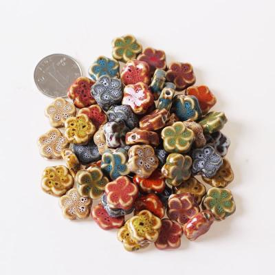 China 15mm Ceramic Flower Shape Bead DIY Perforated Bead Jewelry Accessories 11 Colors Accept Customize Color MISSXIANG C2004035 for sale