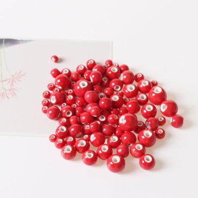 China Ceramic Beads 6-14mm Red Ceramic DIY Beads For Jewelry Making for sale