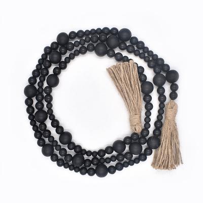 China Black Wooden Beads Home Decortion Creative Home Wooden Garland for sale