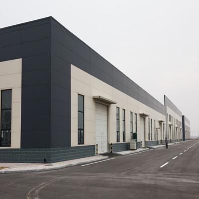 China Modern Industrial Cold Storage Room Prefab Garage Workshop Shed Pre Fab Warehouse Building for sale