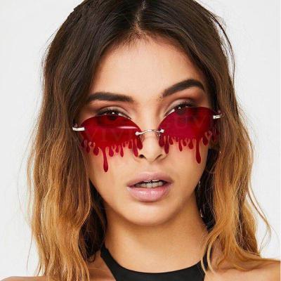 China Fashion SKYWAY Sunglasses Shape Diamond Sunglasses Women Vintage Unique Rimless Tears Shape Female Sunglasses for sale