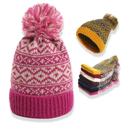 China Winter COMMON Hat China Acrylic Jacquard Beanie Hat Custom Knit Pom Pom Hat for sale