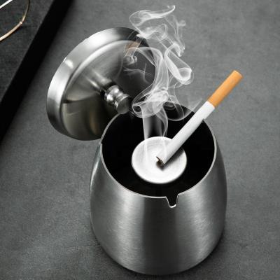 China Stored thickened stainless steel ashtray with lid custom creative ashtray with lid for sale