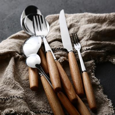 China Beech Wood Handle 304 Stainless Steel Cutlery Set Creative Western Creative Western Spoon Fork for sale