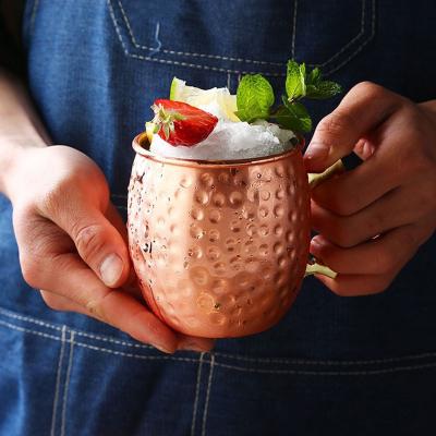 China Sustainable Moscow Mule Mug Stainless Steel Cocktail Jiu Shot Glass 550ml Hammer Drum Mug for sale