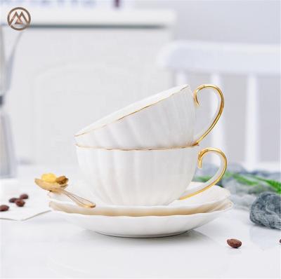 China Sustainable Modern Porcelain Coffee Cup And Saucer Chrysanthemum Shape White Ceramic Tea Cup Set for sale