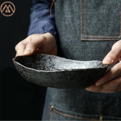 China Viable Raw Pottery Bowl Black Japanese Ceramic Oval Restaurant Tableware Salad Bowl for sale