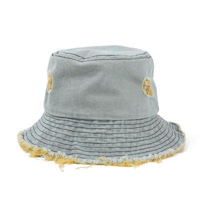 China Hot Selling Character Fringed Brim Cleared Worn Design Mens Womens Summer Sun Shade Hat Denim Cool Bucket Hat for sale