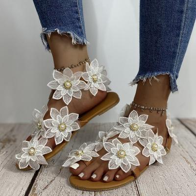 China Fashion Trend Beach Sandals Open Toe Slipper Buckle Flat Women Sandals With Flower for sale