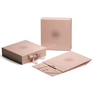 China Recyclable Luxury Magnetic Collapsible Gift Boxes With Custom Logo Foldable Rose Gold Gift Box With Ribbon Bow for sale