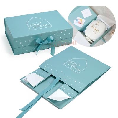 China Recyclable Infant And Toddlers Apparel Packaging Custom Printed Magnet Folding Gift Box With Ribbon for sale