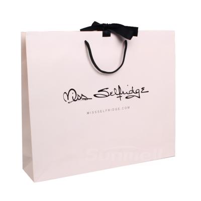 China Handmade Light Pink Custom Logo Clothing Paper Bags Ribbon Closure Packaging Paper Bags For Clothing for sale