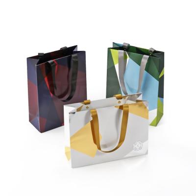 China Recyclable Sumptuous Glossy Finish Paper Bags With Your Own Logo For Paper Gift Box for sale