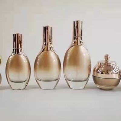 China Cosmetic Bottle Amber Gold Dropper Pink Dropper Bottle Electroplate Glass Bottle for sale